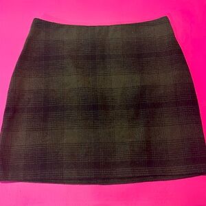 green and black skirt